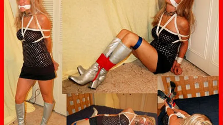 Armanie Knight is bound in gagged in silver boots