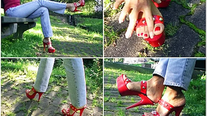 on a paved away in my red plateau high heels