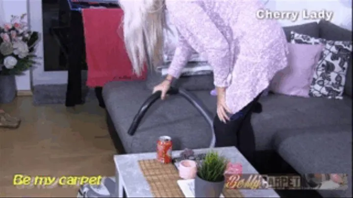 Cherry Lady vacuuming livingroom close up cam