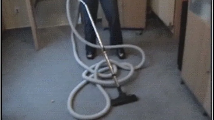 Fräulein Schmidt wearing nylons and vacuuming with cantral vacuumcleaner