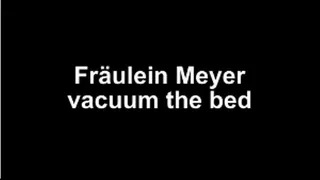 Fräulein Meyer vacuum the bed