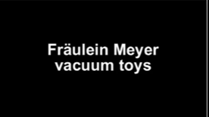 Fräulein Meyer vacuum toys from bed