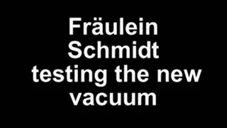 Fräulein Schmidt testing the new vacuum