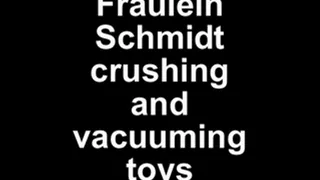 Fräulein Schmidt crushing and vacuuming toys