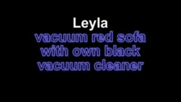 Leyla vacuum red sofa with her own black vacuum