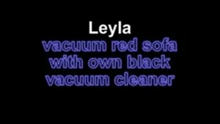Leyla vacuum red sofa with her own black vacuum