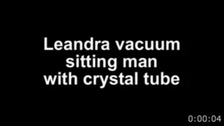 Ela vacuum siiting man with crystal tube