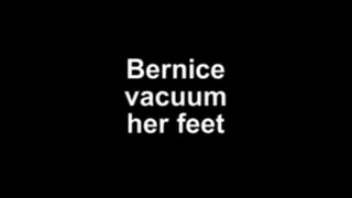 Bernice vacuum her feet