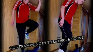 Gus trampling in sneakers and socks