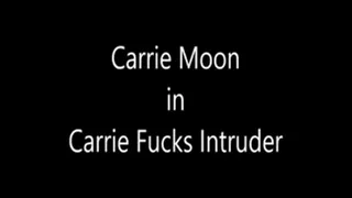 Carrie fucks intruder with strapon