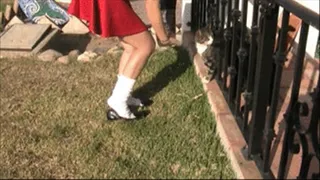 Hooters socks & penny loafers on the grass