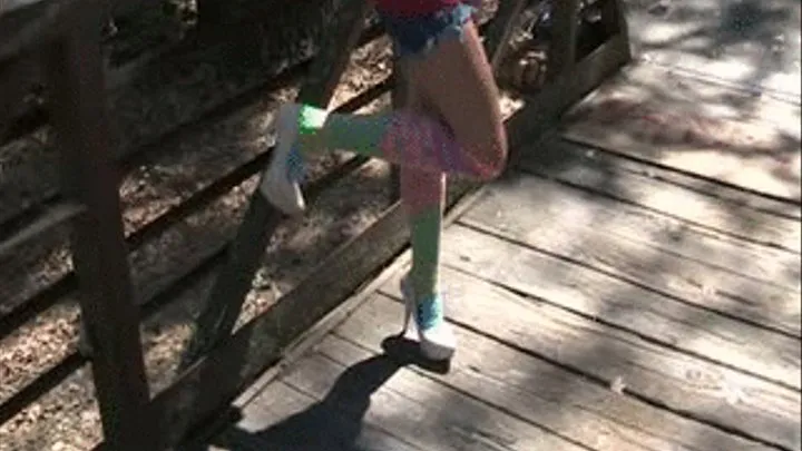 High heels & knee sox on a wood bridge