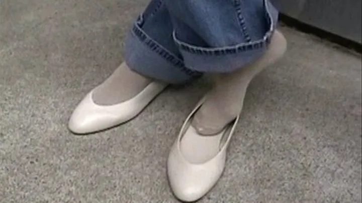 Jeans, beige ballet flats & bobby sox - Shoeplay on concrete