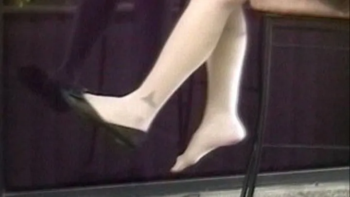 Barstool shoeplay - black flats white stockings