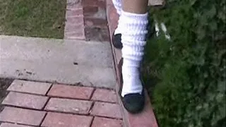 Hooters socks & penny loafers on the steps