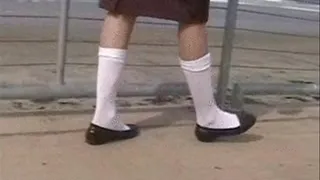 Penny loafers & knee socks @ a railing