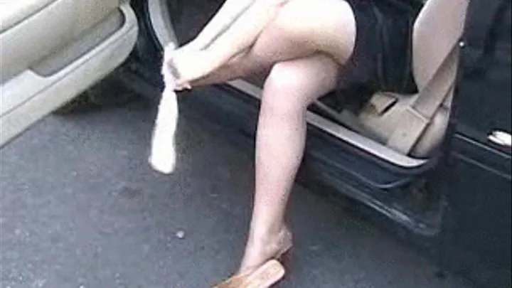 Ankle sox and high heel mules at the car