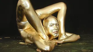 contortionist gets golden painted