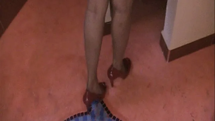 Red patent high heels barefoot in the shower