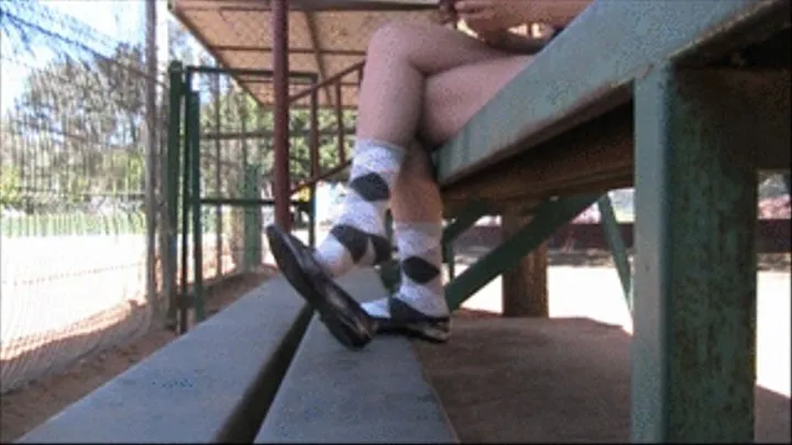 Shoe thief ~ Well worn penny loafers & socks in the bleachers