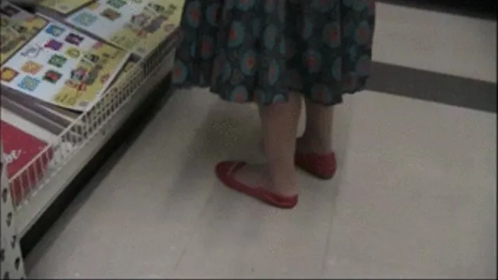 Red flats and nylons at Office Max