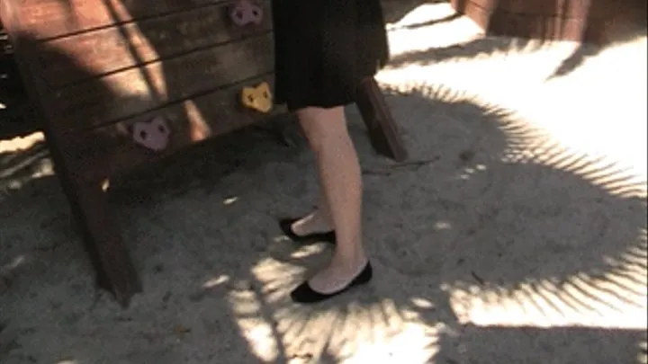 Heel crush black flats barefoot at playground