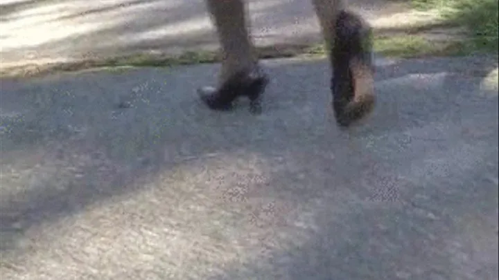 High heel walk out in a water puddle