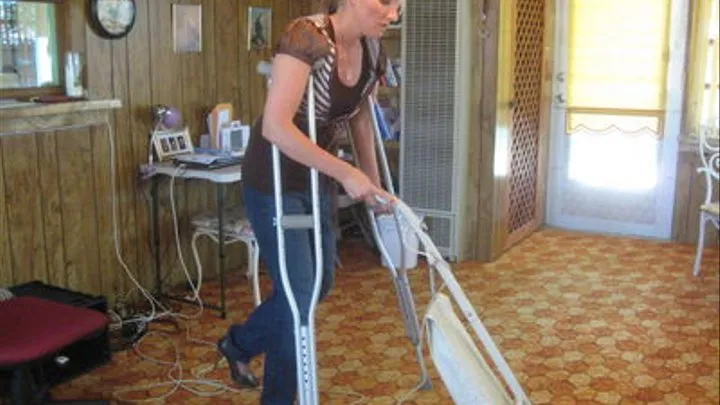 vacuuming on crutches