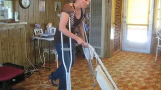 vacuuming on crutches
