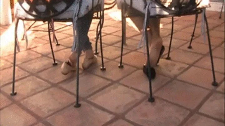 2 girls in flats barefoot & nylons @ lunch on patio