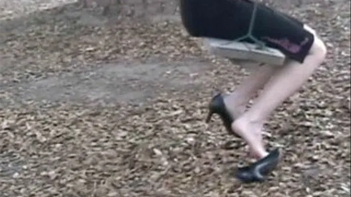 Shoeplay on a swing with black peep toe high heels & stockings