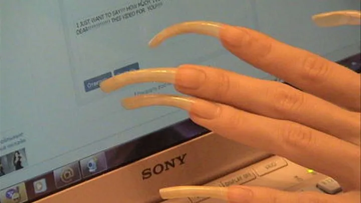 Long nails on laptop