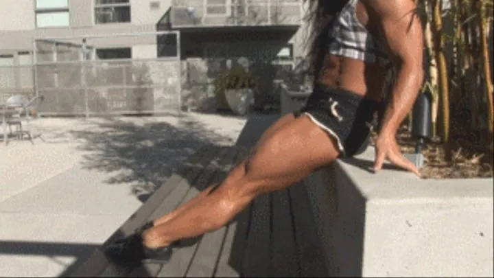 Dana Black Shorts Seated Calves Outdoors