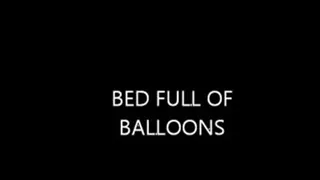 BED FULL OF BALLOONS