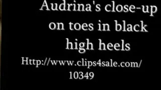 Audrina close-up on toes in black stliettos