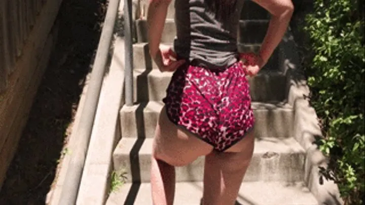 Luscious Lopez short shorts on stairs