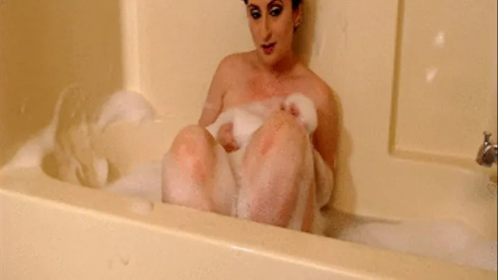 Luscious Lopez bubble bath feet