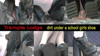 dirt under a school girls shoe