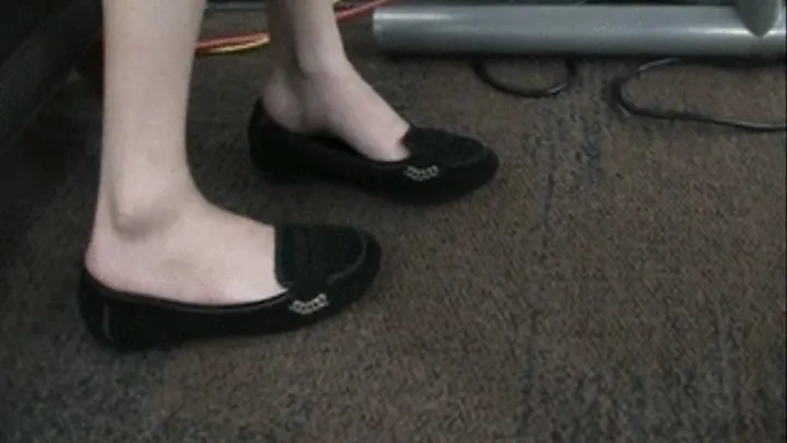 Black suede flats barefoot at the library