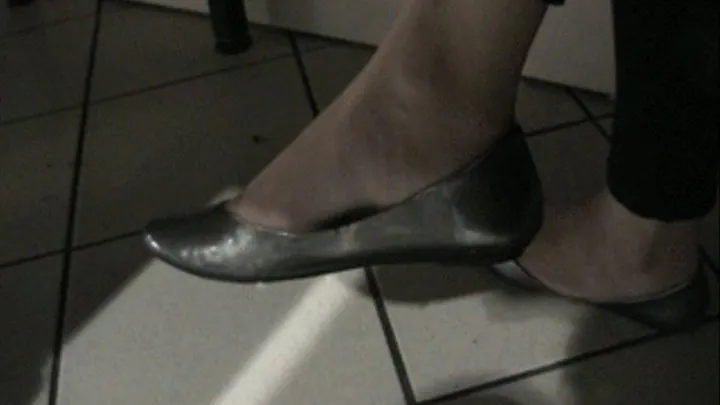 New silver patent flats barefoot in the cafeteria