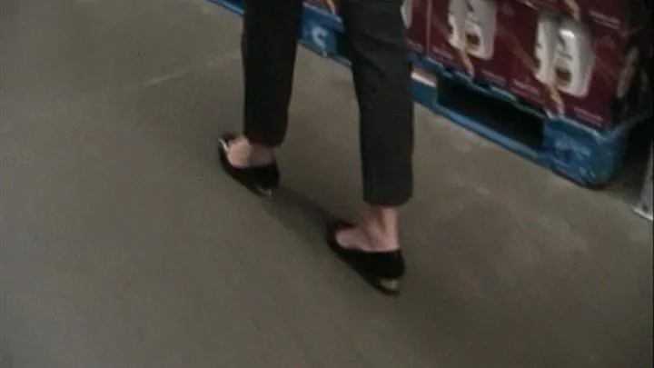 New J Crew black flats barefoot at Sam's Club