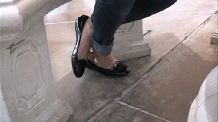 Black patent flats barefoot with jeans at food court