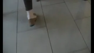 Tan loafers barefoot at standing fast food