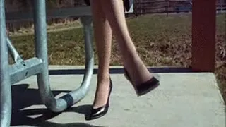Black leather high heels ~ Shoeplay at a bench