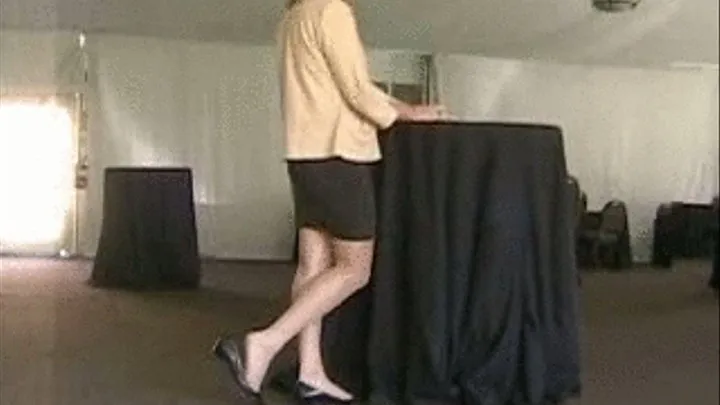 Low black heels at hotel conference room