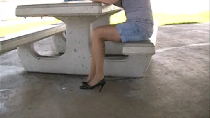 Black high heels & nylons @ park bench