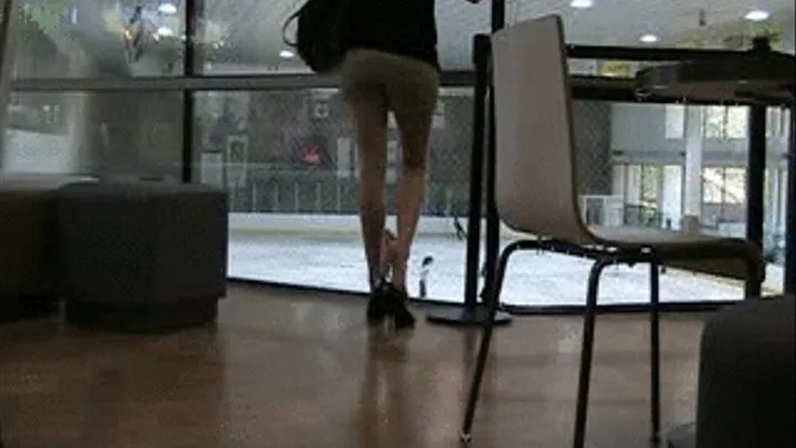 Black heels dipping @ ice skating rink