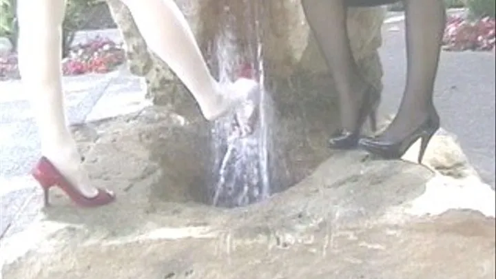 Black patent heels & red peep toes in the fountain