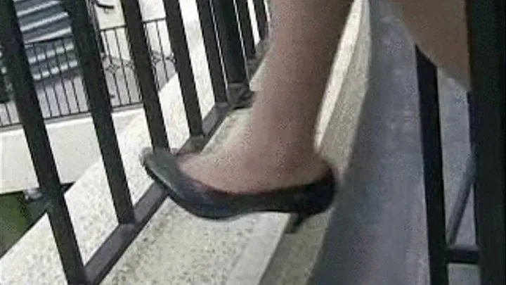 Black patent heels ~ Dangling under table at the mall