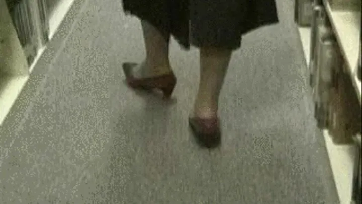 Low heels dipping at the library